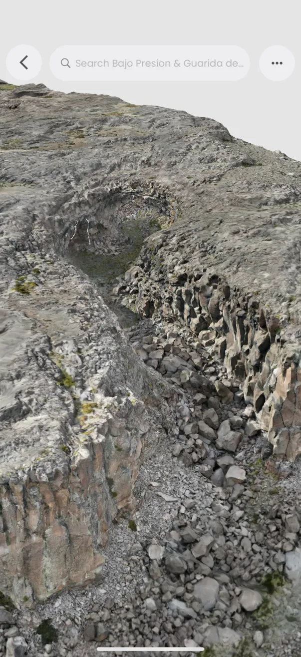 High-resolution 3D cliff model viewed from above a rocky gully.
